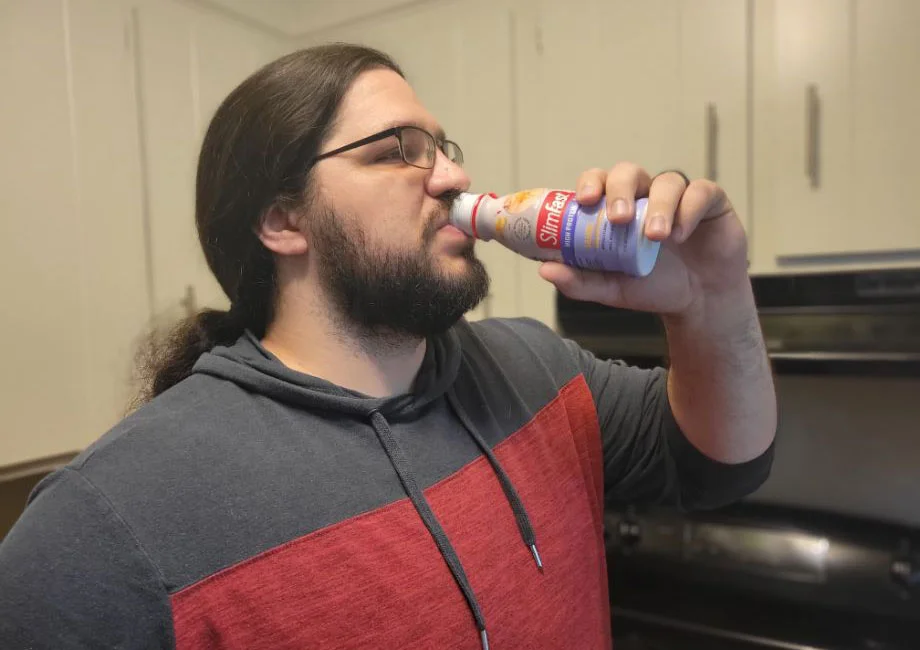 GGR staff writer Caine Wilkes drinking a SlimFast shake.