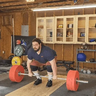 A gif of a traditional deadlift