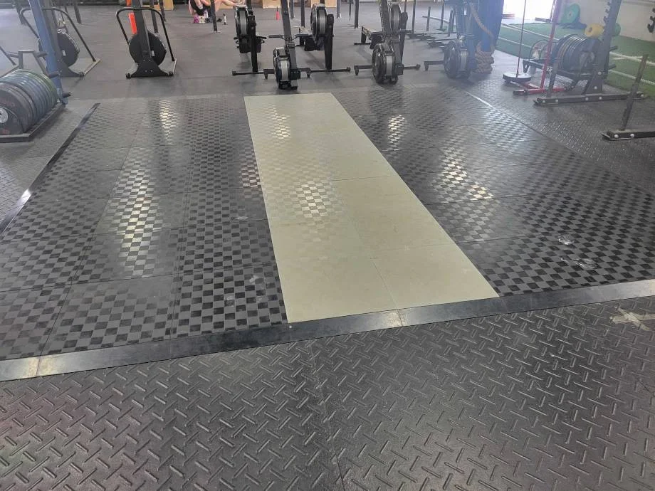 Looking at a gym with UESAKA Puzzle Platform flooring installed