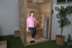 jess sitting in a plunge the sauna mini