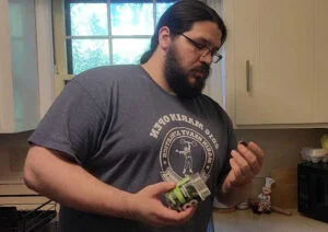 person about to take 8greens gummies cover