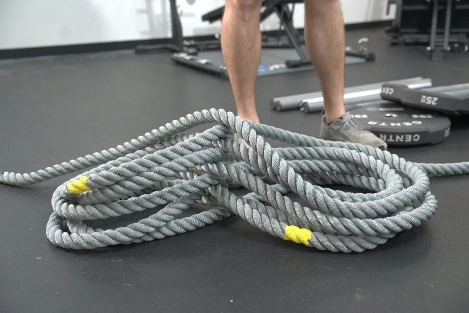 Our tester stands behind a Centr x HYROX Competition Power Rope