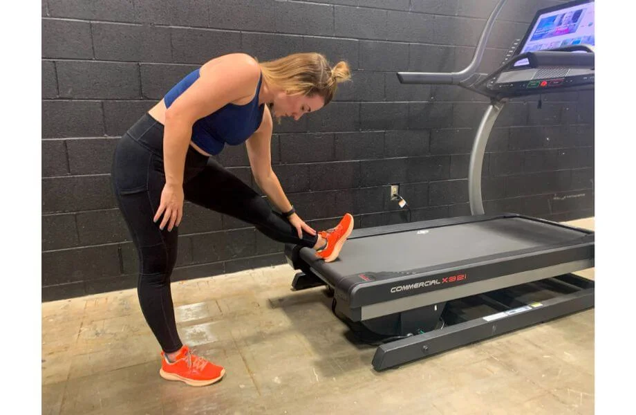 stretching leg NordicTrack Commercial X32i Treadmill