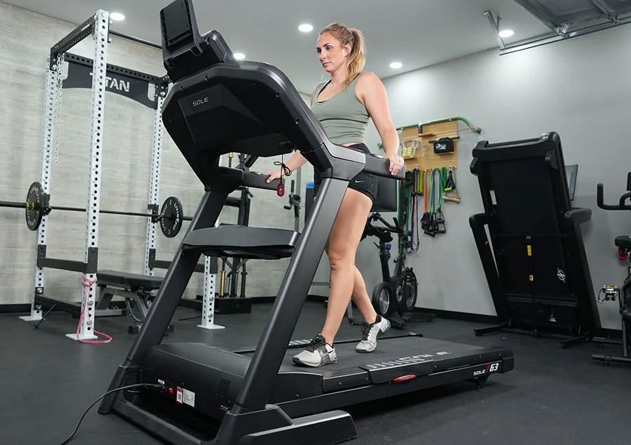 woman training on sole f63 treadmill