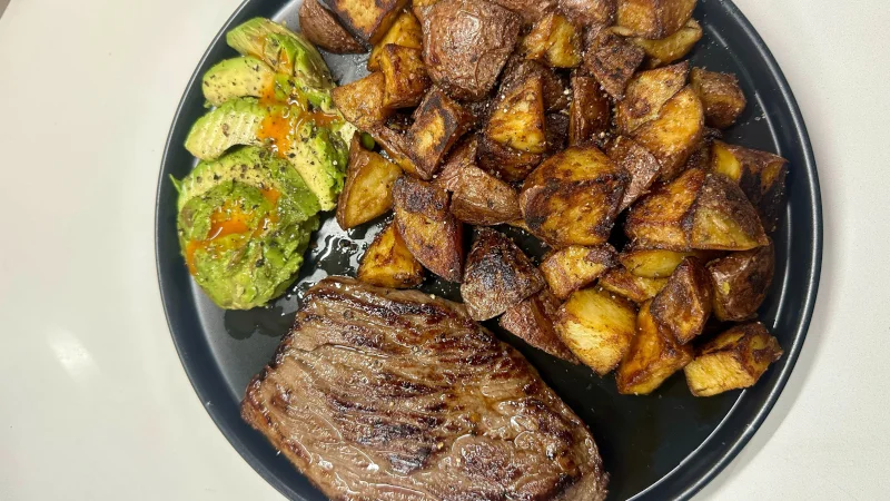 A serious meal for a serious athlete, with meat, potatoes, and veggies