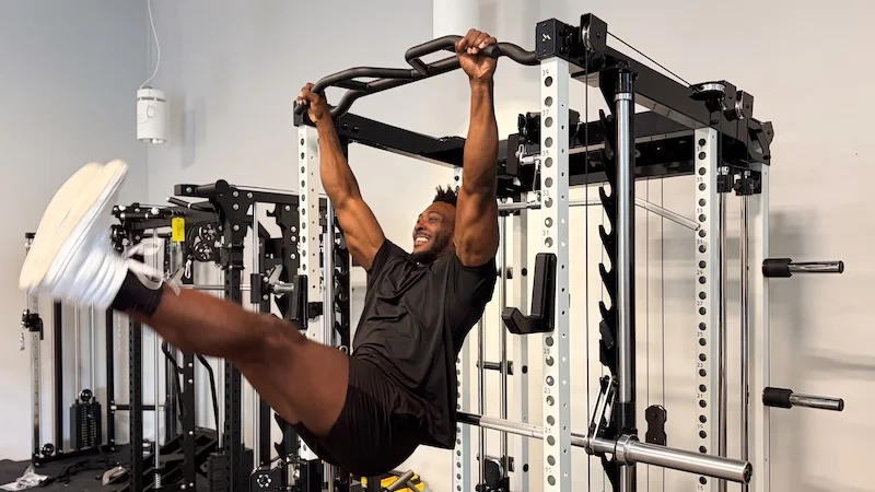 Product tester performs pull-up on REP Fitness Altitude Power Rack