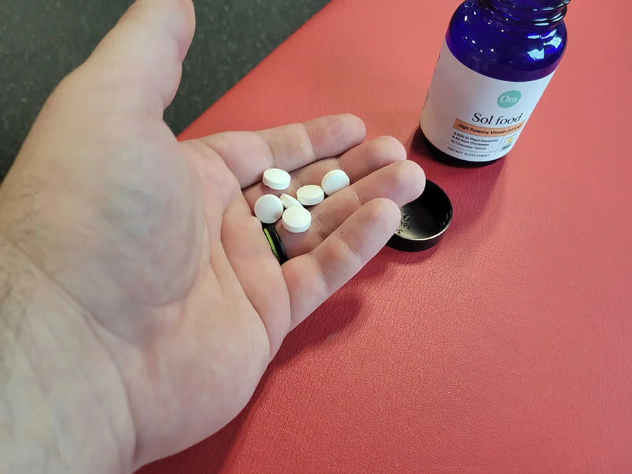 ora-sol-food-d3-k2-tablets-in-hand