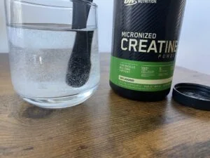 optimum nutrition creatine powder in glass
