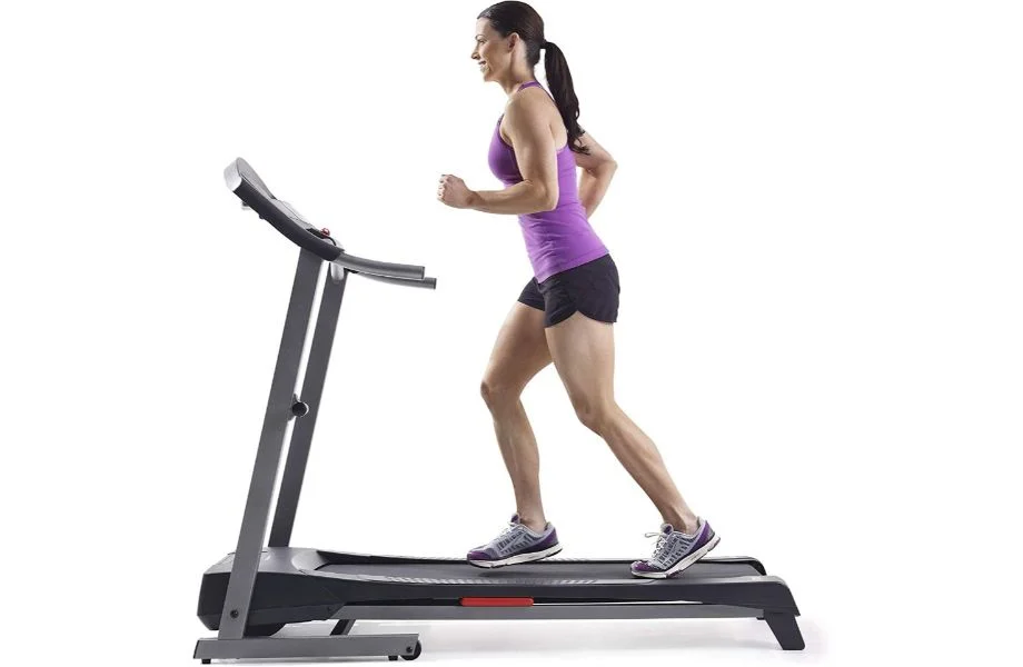 Woman using Weslo Cadence G 5.9i Treadmill