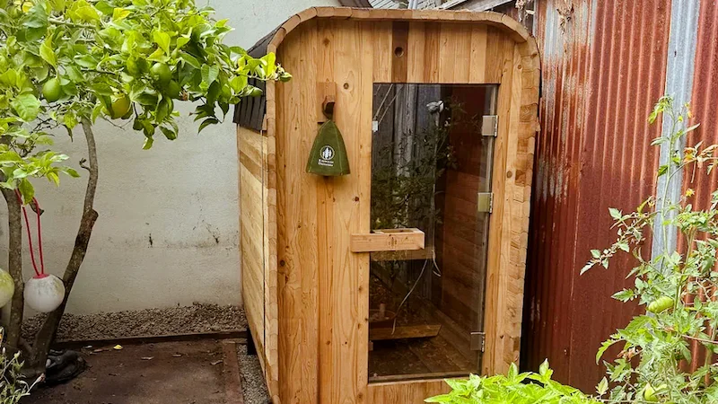 redwood-outdoors-duo-sauna-yard Redwood Outdoors Duo Sauna in a backyard setup