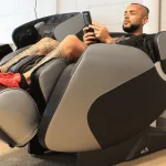 Our tester adjusting their massage settings on the Relaxe Zero-Gravity Shiatsu Massage Chair