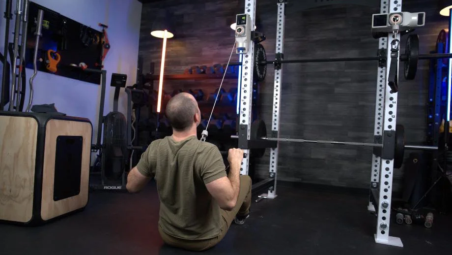 Product tester looking at the console on the Horizon 7.0 AT treadmill