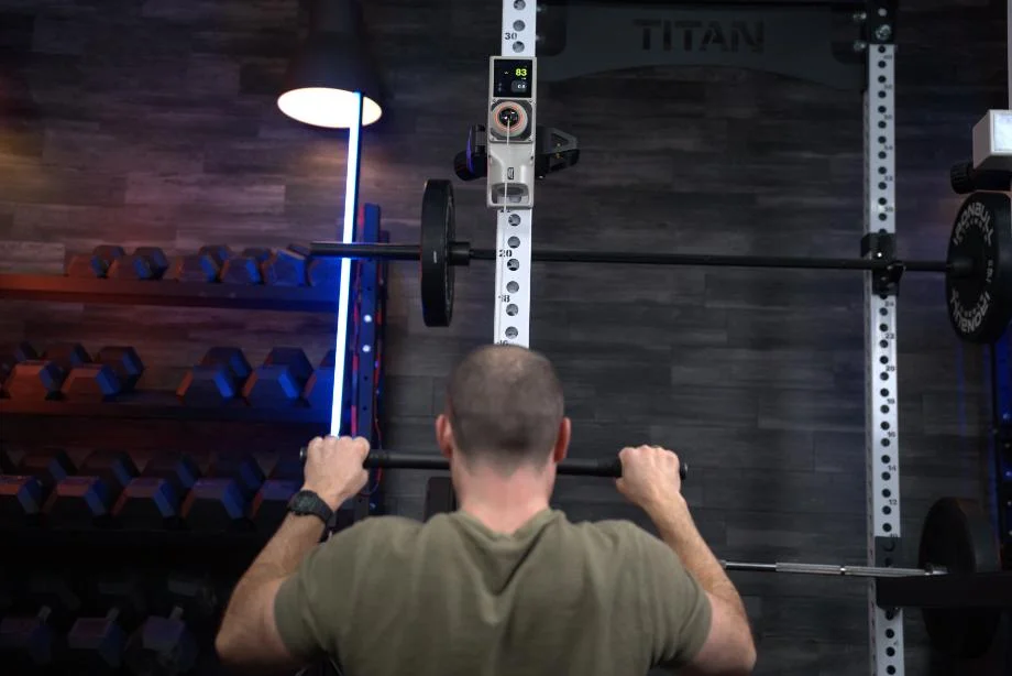 Coop does lat pulldowns with a single Beyond Power Voltra I machine.