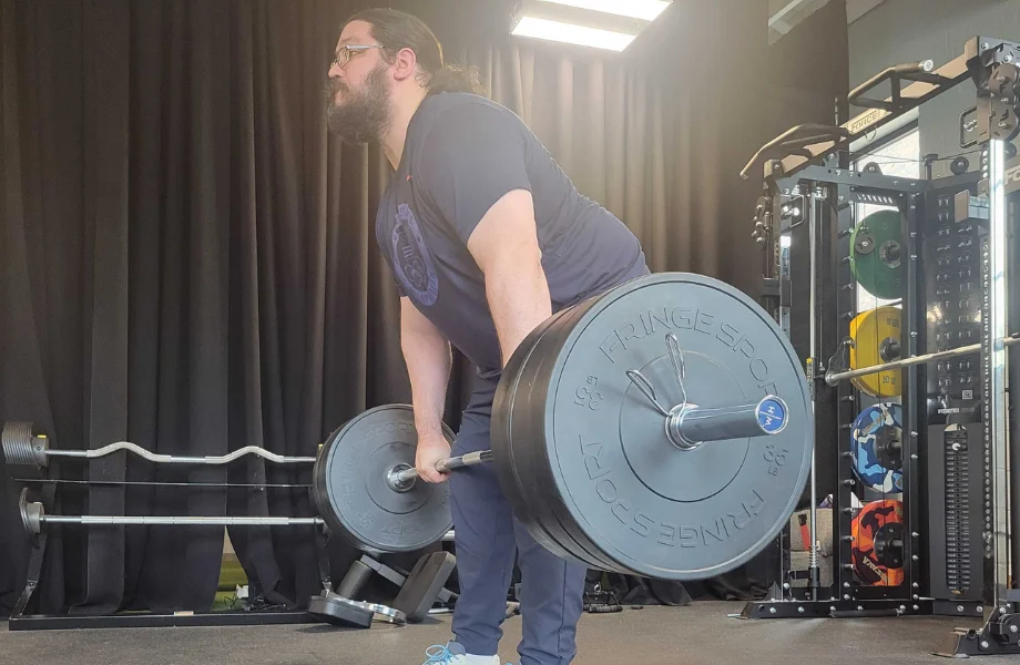 Our tester training with Fringe Sport Black Bumper Plates