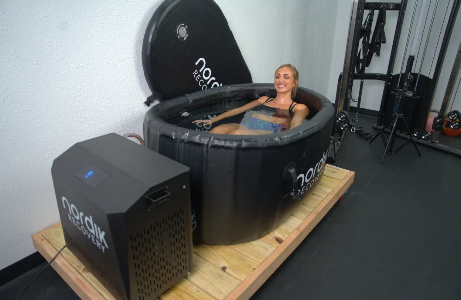 Our tester taking a soak in the Nordik Recovery Cold Tub