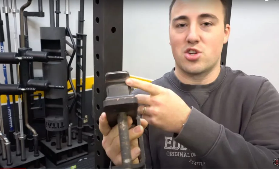 Man pointing to a DIY j-hook liner