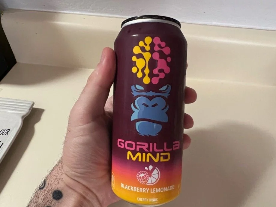 Our tester holding Gorilla Mind Energy Drink