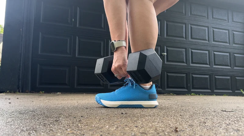 Nicole Davis performing a dumbbell RDL with the RingConn 2 Gen Air