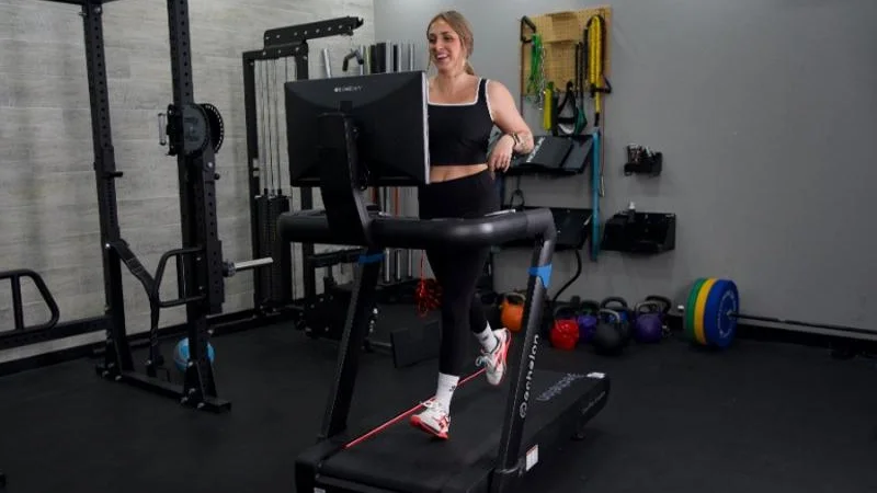A person running on the Echelon Stride 8s treadmill.
