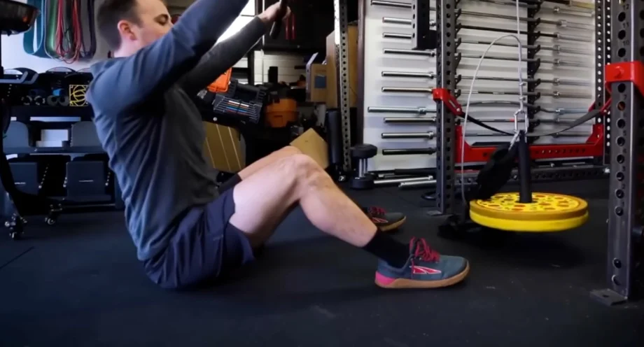 performing lat pulldowns on stall mats