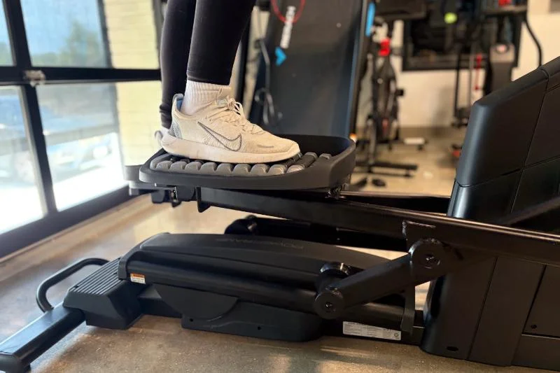 A person shown pedaling on the NordicTrack AirGlide 16