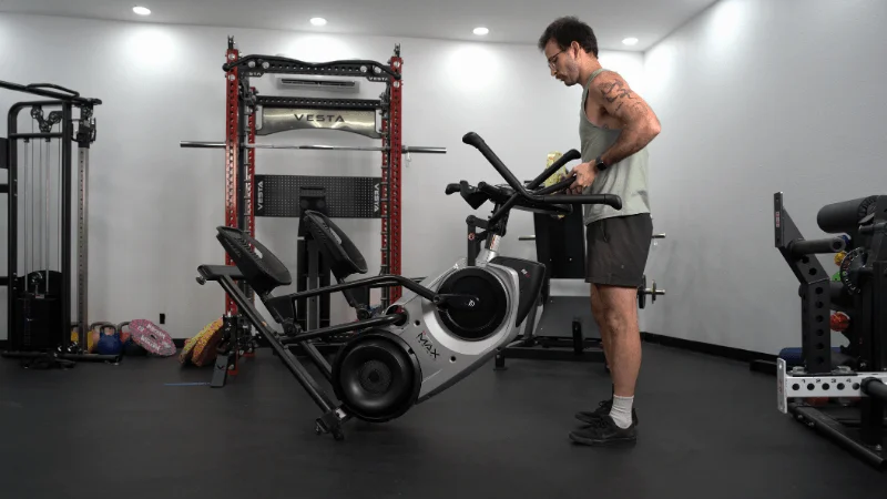Our tester moving the Bowflex Max Trainer M6 into position for a workout