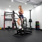 A person runs at an incline on the Xebex Trekker 4000 treadmill.
