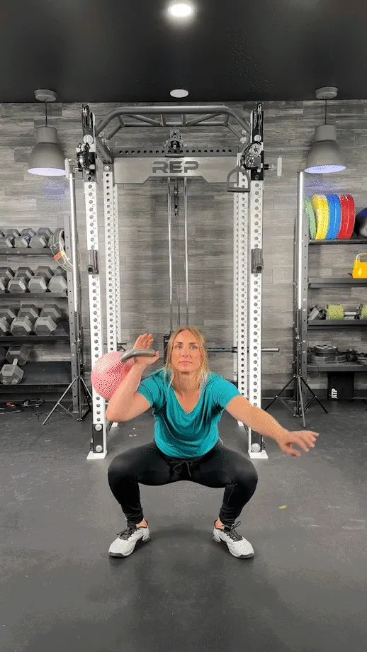A gif of a kettlebell thruster