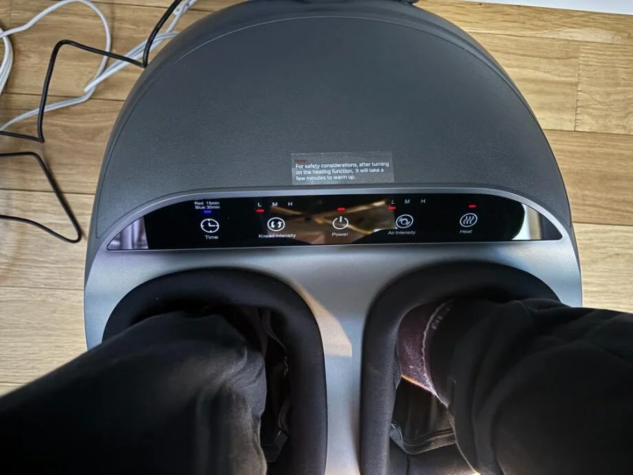 Looking down at your feet in a Renpho Foot Massager Machine