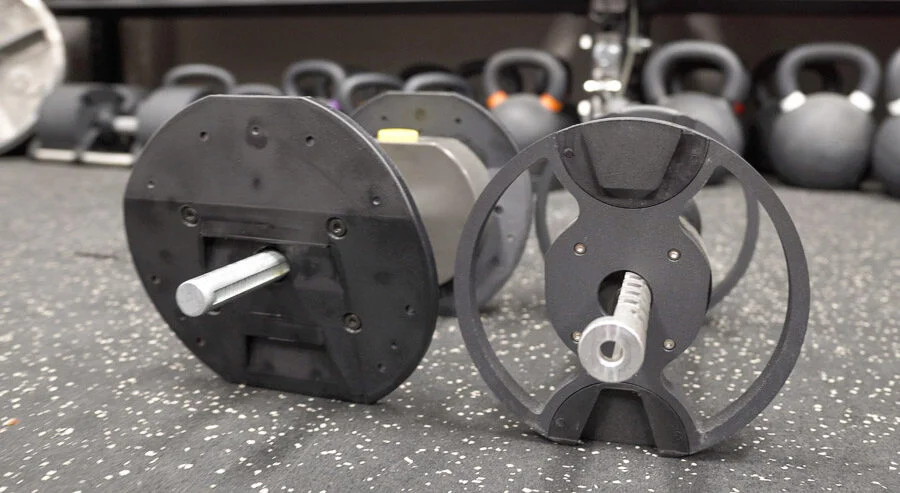 Inside of the adjustable dumbbells.