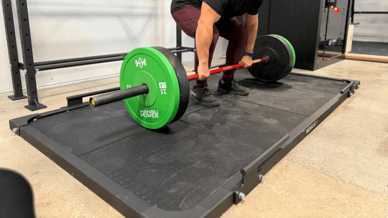 Our tester training atop the Rogue Deadlift Platform