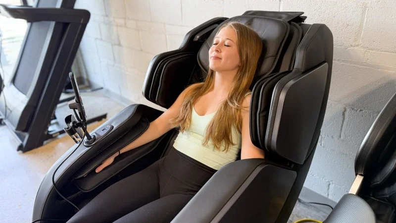 Our tester preps for the Bob and Brad Massage Chair review