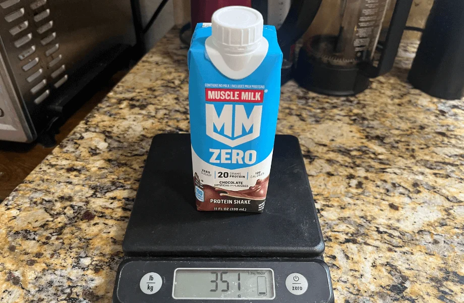 Our tester weighing a single ready-to-drink serving of Muscle Milk Zero Protein