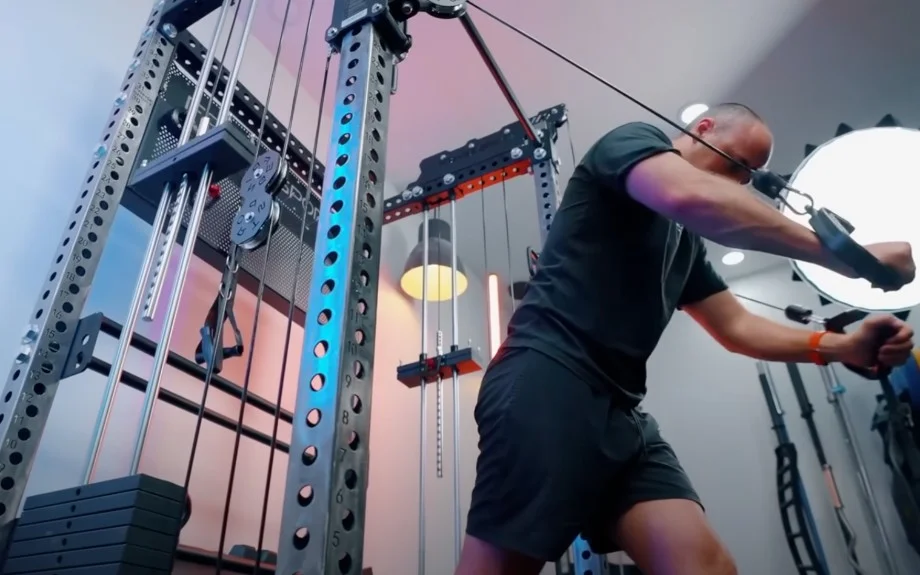 Profile view of Coop using cables on a Titan Fitness Functional Trainer