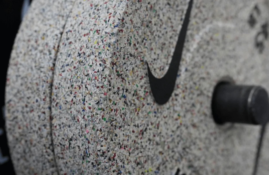 A closeup view of the Nike Grind Bumper Plate's speckled aesthetic
