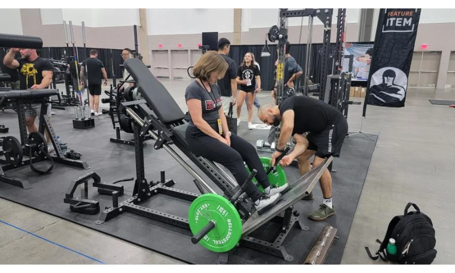 Using a new Bells of Steel prototype at HomeGymCon 2026