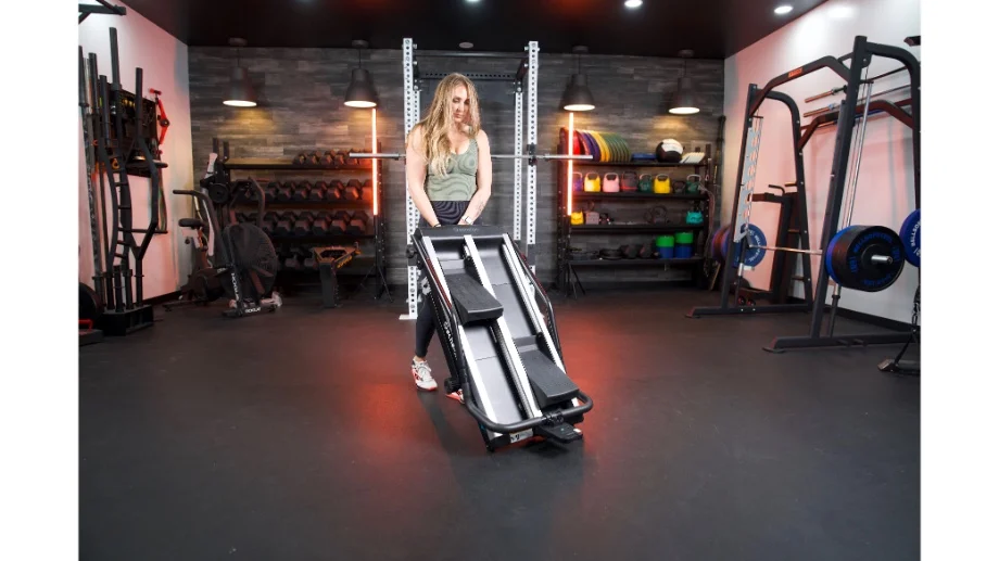 Our tester moving the Echelon Stair Climber Sport.
