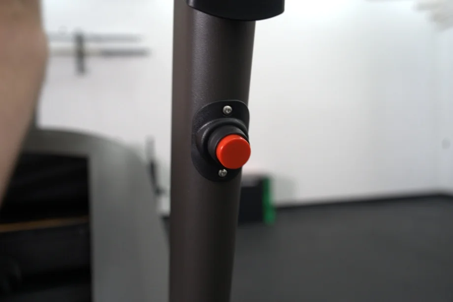 Red button on a Matrix C50 Climbmill