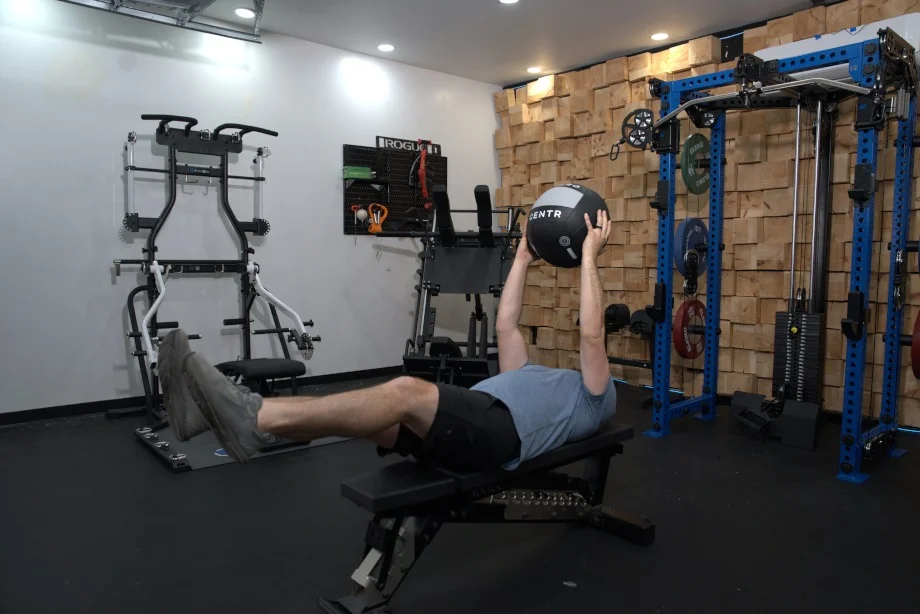 Our tester working out with a Centr x HYROX Competition Wall Ball