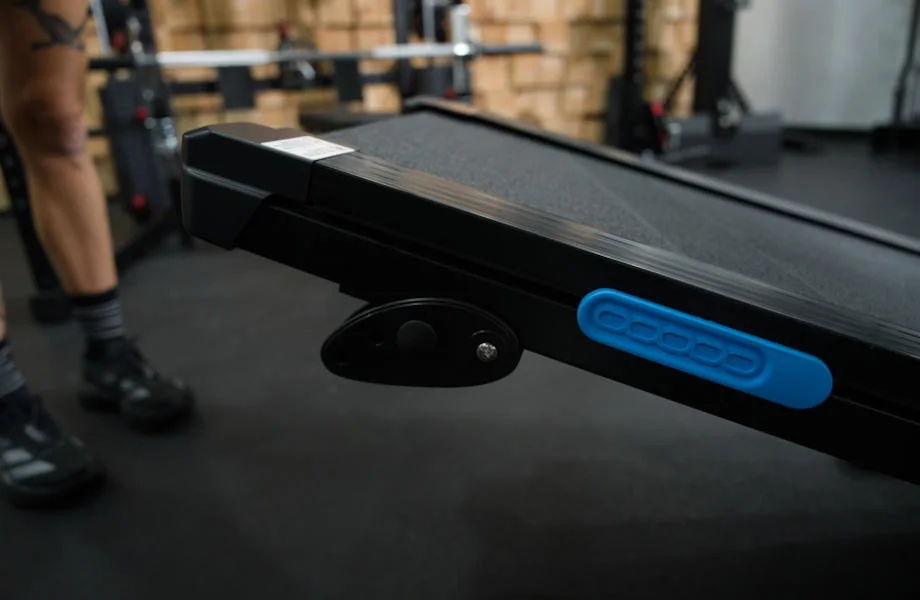 A close look at the side of a Merach T12 Foldable Walking Treadmill