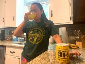 woman drinking crazy nutrition creatine