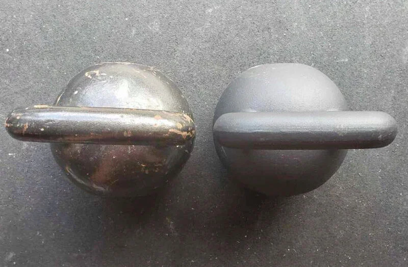 Onnit Kettlebells on garage gym flooring