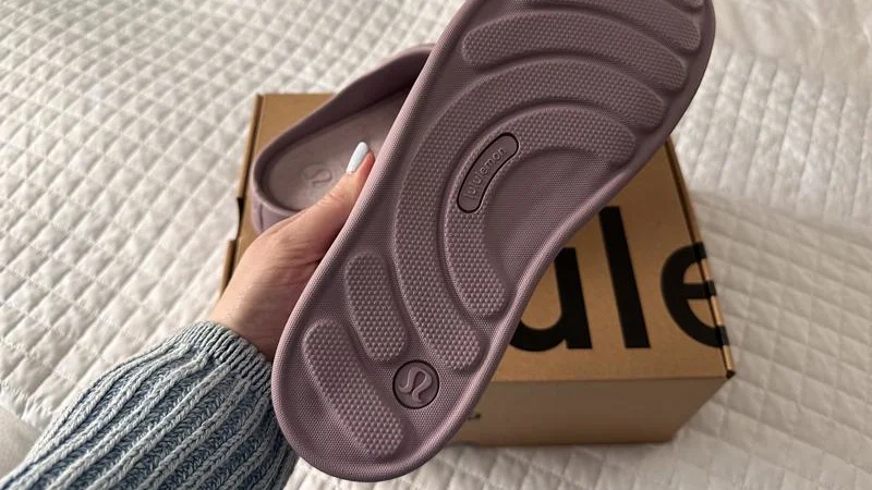Looking at the tread on a brand new Lululemon SwayDay Mule recovery shoe.
