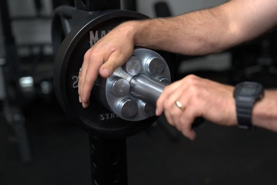 Weight It Out Revolver on a barbell