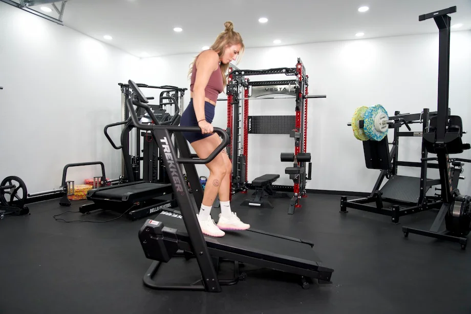 Lindsay Scheele, CPT walking backwards on the Xebex Trekker 4000 treadmill.