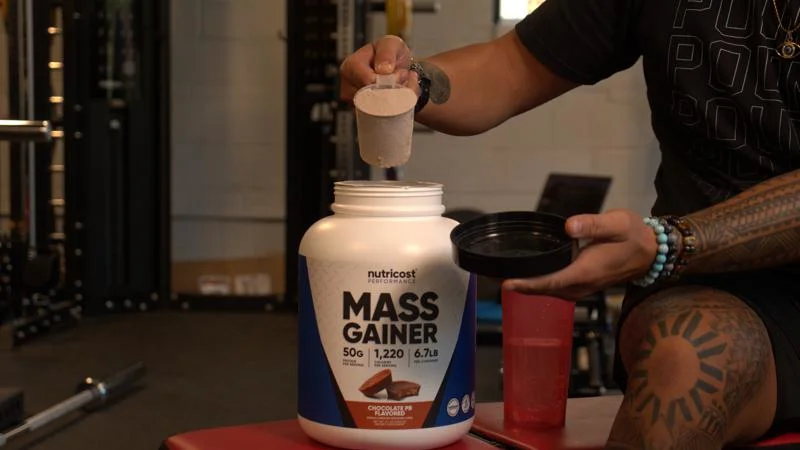 our tester preps a serving of nutricost mass gainer 1