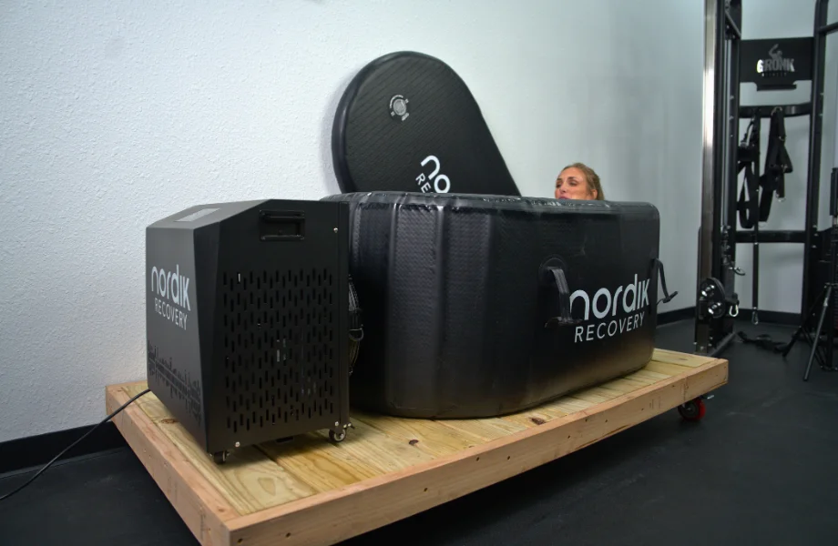 Our tester taking a soak in the Nordik Recovery Cold Tub