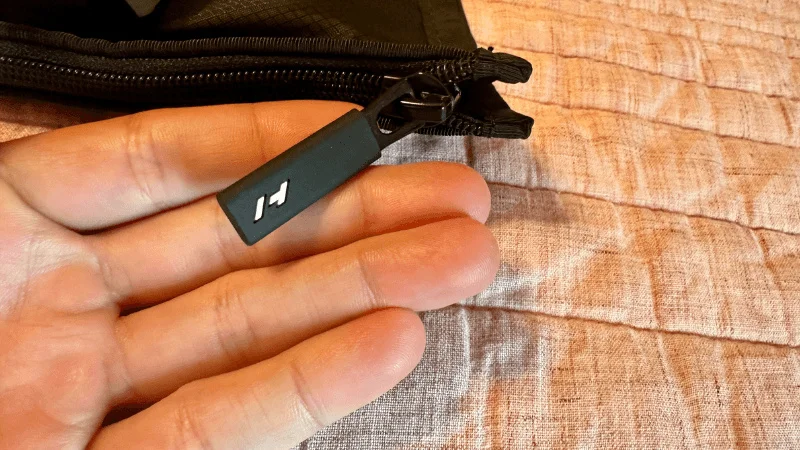 A close look at the zipper enclosure on a pair of Hyperice Normatec Elite compression boots