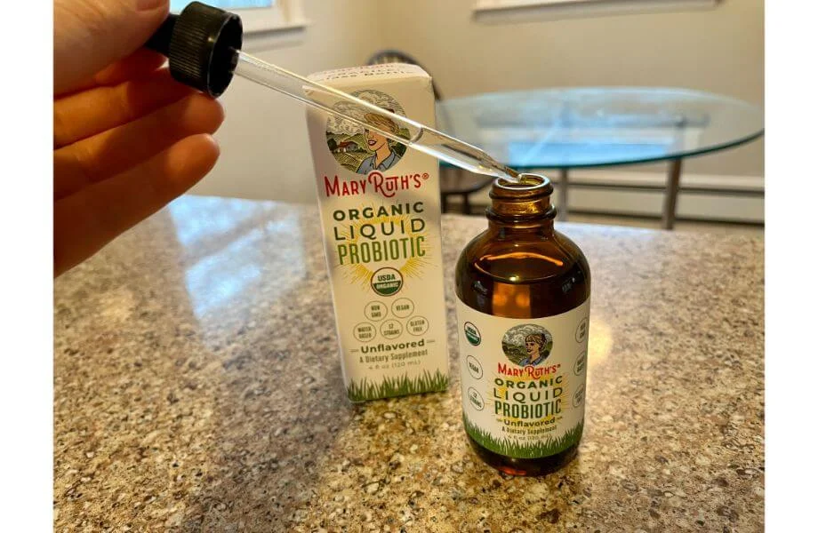mary ruth liquid probiotic hand holding tube